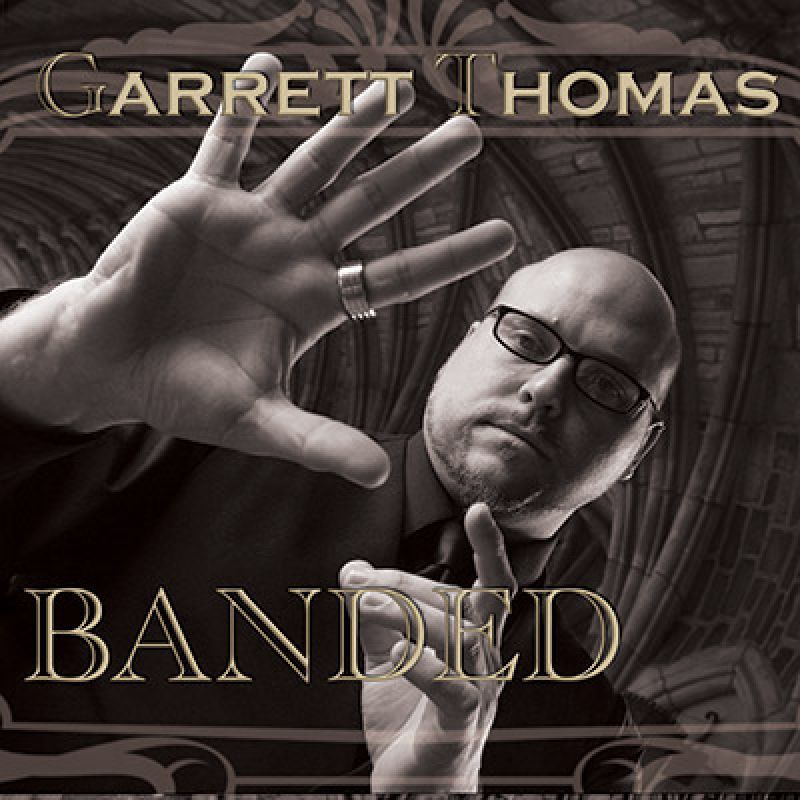 Foto Banded 24 mm (Gimmicks and Online Instructions) by Garrett Thomas and Kozmomagic - Trick